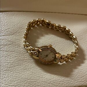 L👀K Pretty Elegant Gold Women's Watch with glass stones - Works great